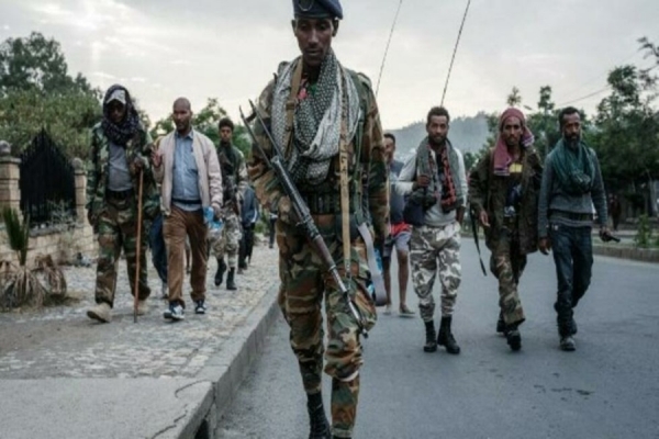 Combatentes das Forças de Defesa do Tigray , em Mekele, capital do Tigray no final de Junho de 2021. Braço armado da Frente Popular de Libertação do Tigray, que a 4 de Julho de 2021 colocou condições para aceitar o cessar-fogo decretado unilateralmente pelo governo federal de Adis Abeba.